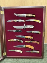 SET OF 12 YEAR OF THE SPORTSMAN HUNTING & FISHING THEME KNIFE COLLECTION